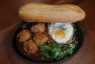 mixed bread-pork meatball & egg on hot pan and bread